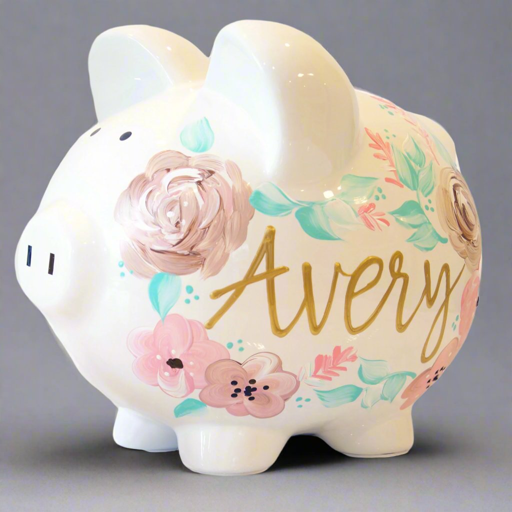 Personalized girls' piggy bank with floral design.